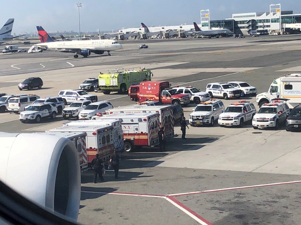 Emergency services on hand after the airliner landed at JFK Airport in New York. Photo:  Larry...