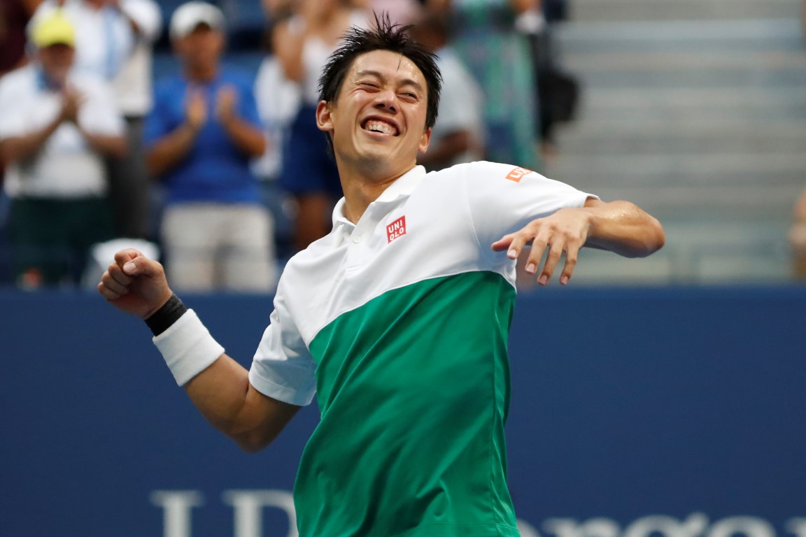 Kei Nishikori celebrates his victory over Marin Cilic. Photo: Geoff Burke-USA TODAY Sports
