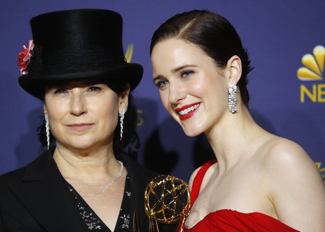 Amy Sherman-Palladino (L) and Rachel Brosnahan pose backstage with their Outstanding Comedy...