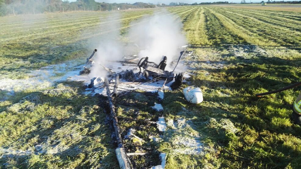The wreckage of the crashed microlight after the fire. Photo supplied