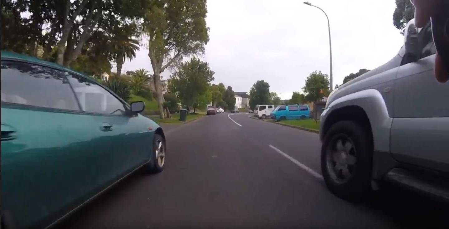 The cyclist says it's lucky no one was killed when the vehicle overtook him and nearly forced him...
