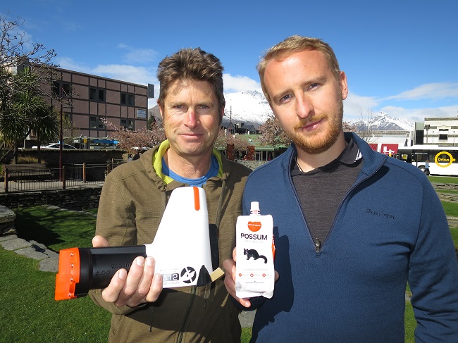  Predator control volunteers Philip Green, left, with a model of a resetting possum trap stolen...