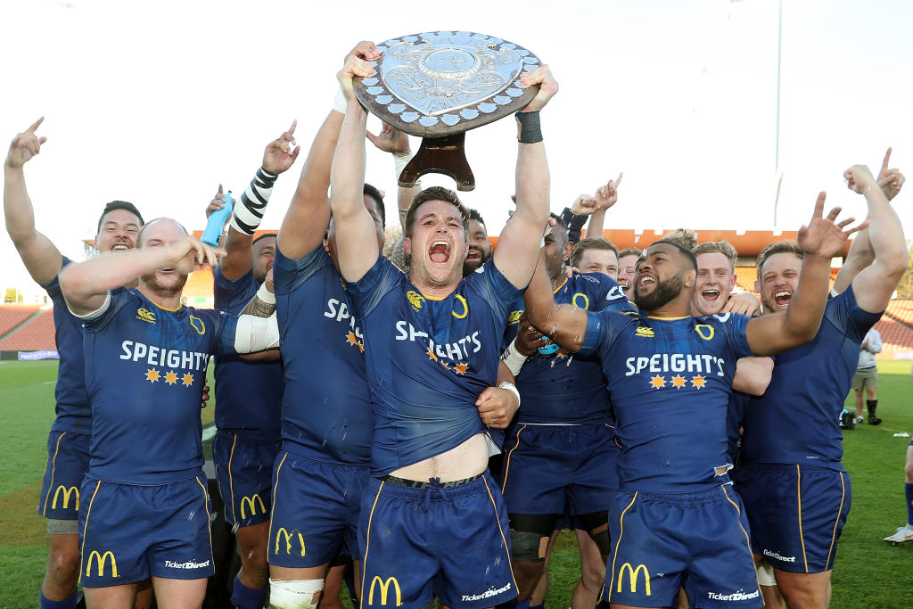 Otago players celebrate with the Ranfurly Shield after their win over Waikato in Hamilton. Photo...