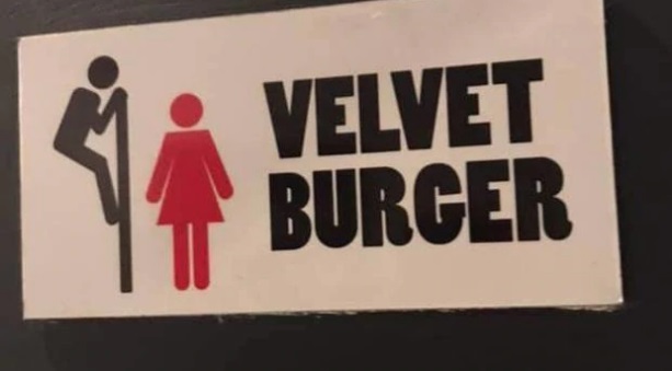 This sign in Velvet Burger's Fort St store in Auckland CBD, apparently indicated three self-contained toilets were unisex. Photo: Supplied via NZ Herald