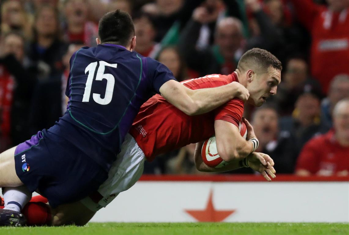 George North dives over to score the first try for Wales. Photo: Reuters