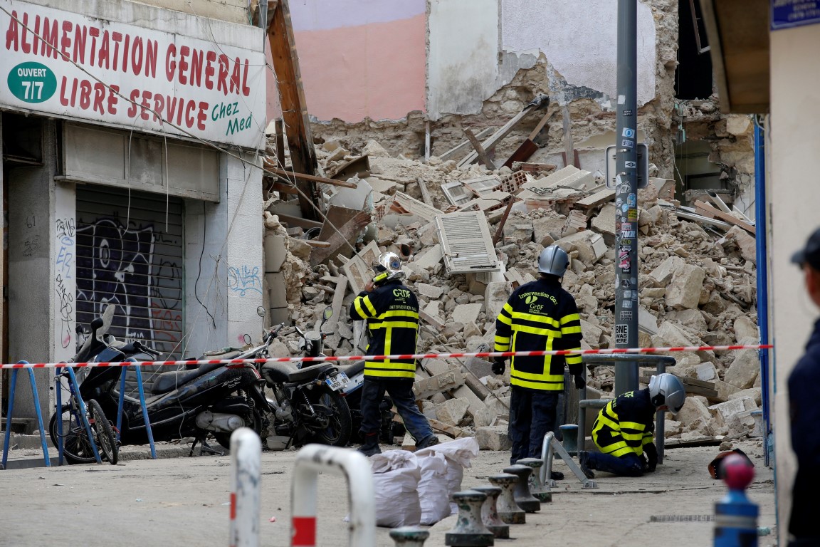 Rescue workers at the scene of the collapse in central Marseille. Photo: Reuters