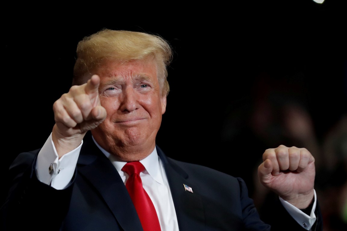 US President Donald Trump acknowledges supporters during a mid-term elections campaign rally at...