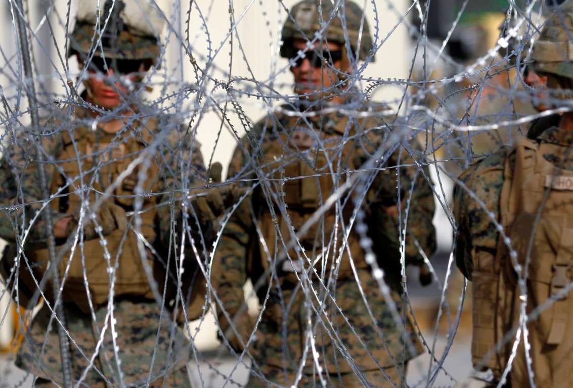 US Marines set up a barricade in Tijuana at the border between Mexico and the United States in...