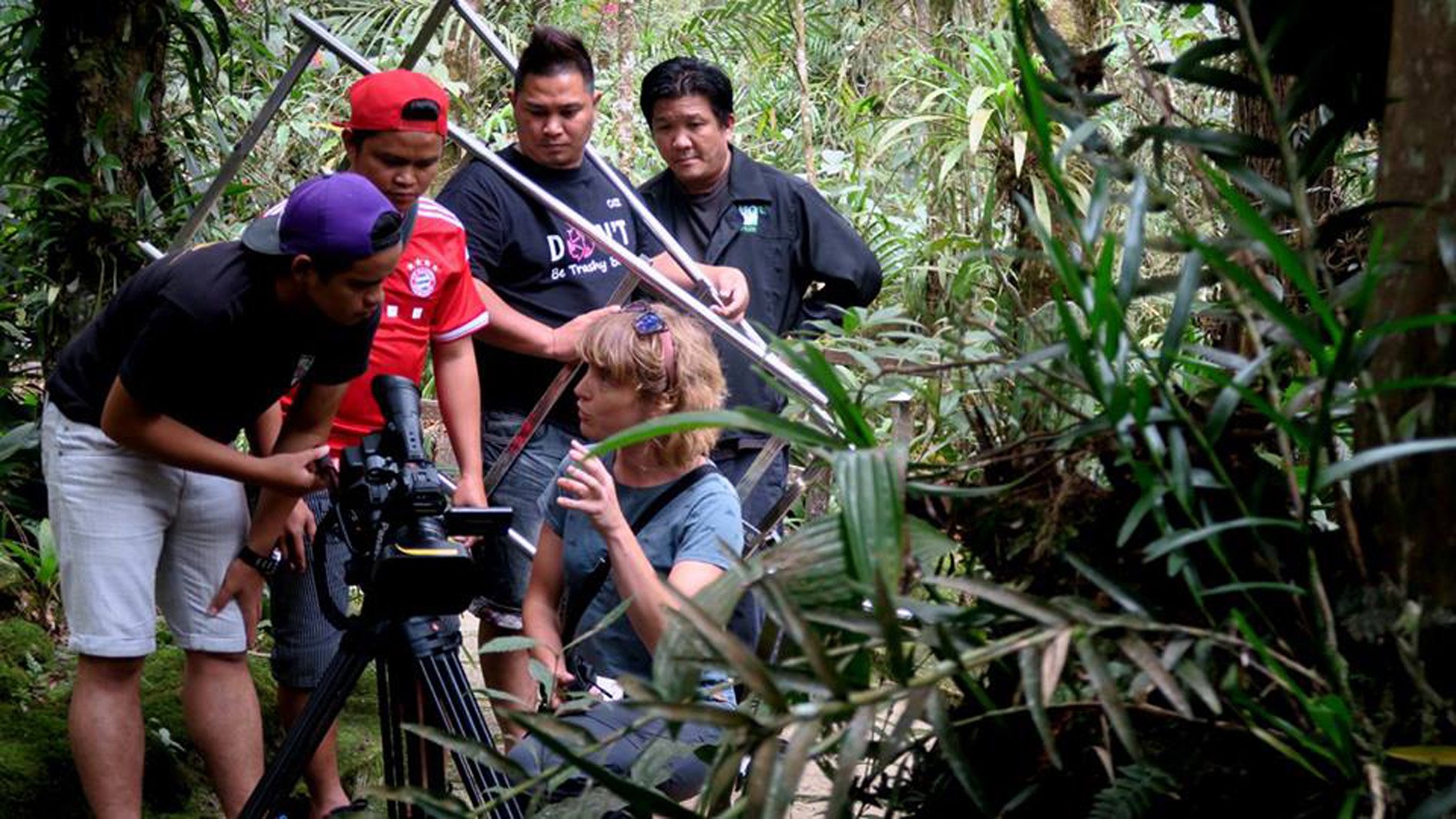 Wiebke Finkler, of the University of Otago, directs students from University College Sabah...