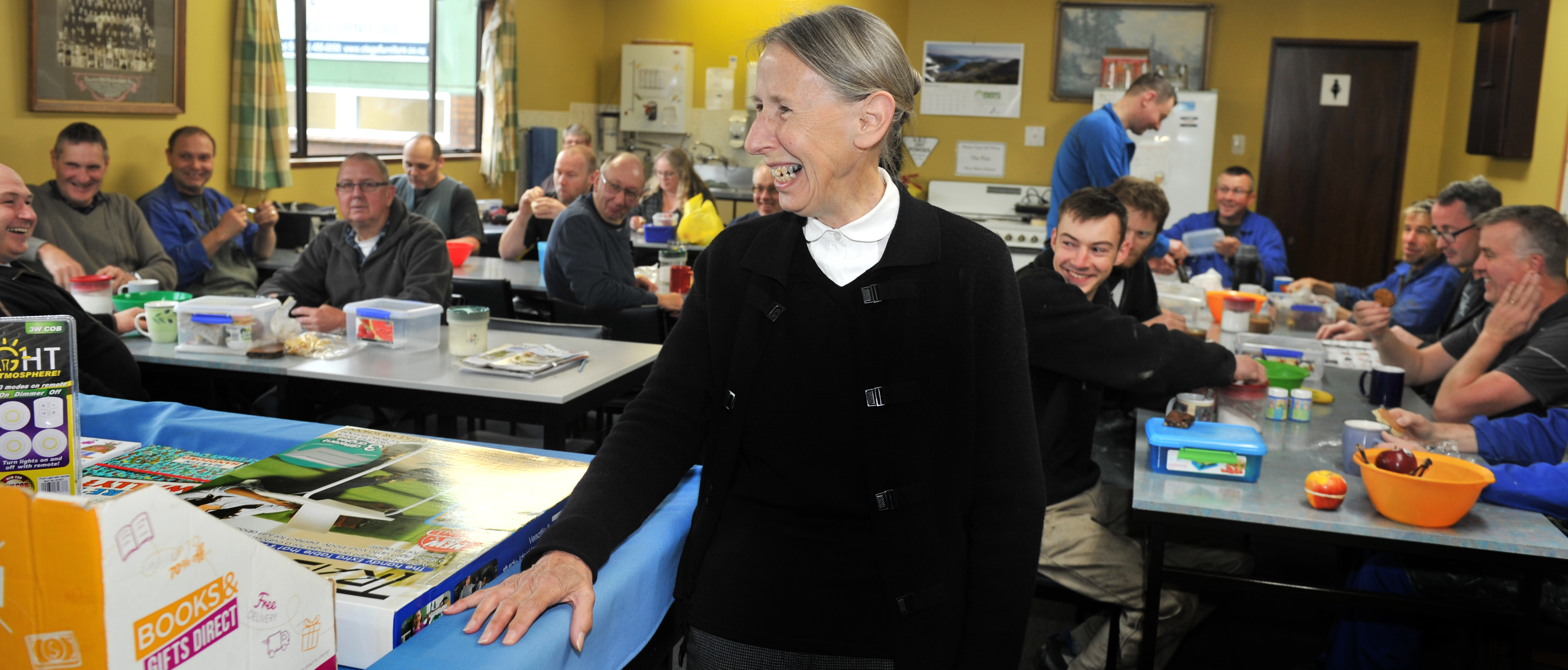 Otago Furniture manager Roye Haugh shares a lighter moment with staff during a morning tea break...