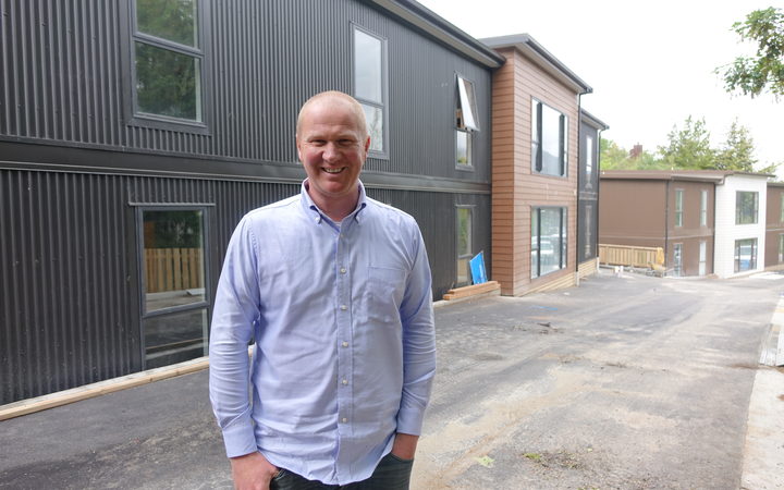 Bus driver and property developer Simon Haslett has helped charity workers move into new...