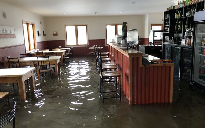 Floodwater in the Tap and Dough Bistro in Middlemarch earlier this week. Photo: Supplied via RNZ 