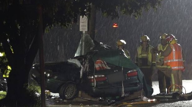 Emergency services at the scene of the fatal crash in Auckland. Photo: NZ Herald