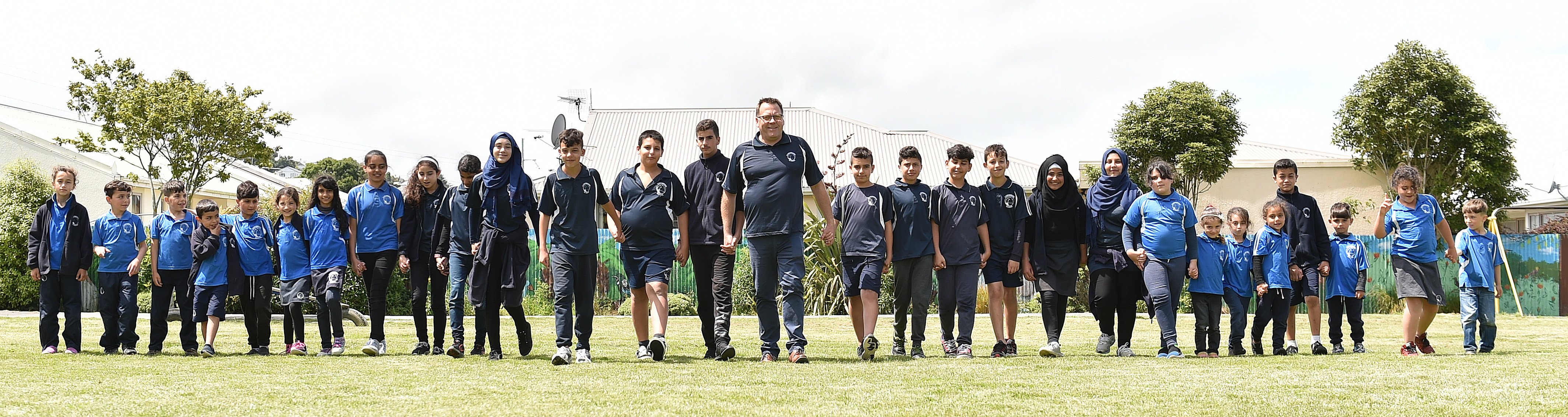 With principal Ben Sincock (centre) are (from left) Baraa Alabdo, Yazan Ghanam, Mohammed Azan,...