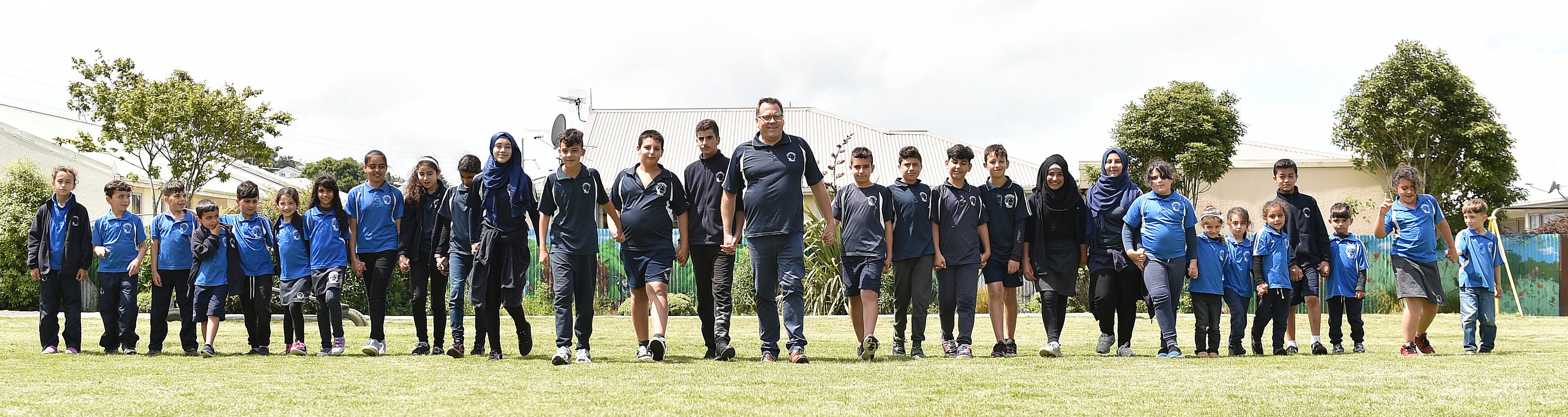 With principal Ben Sincock (centre) are (from left)   Baraa Alabdo, Yazan Ghanam, Mohammed Azan,...