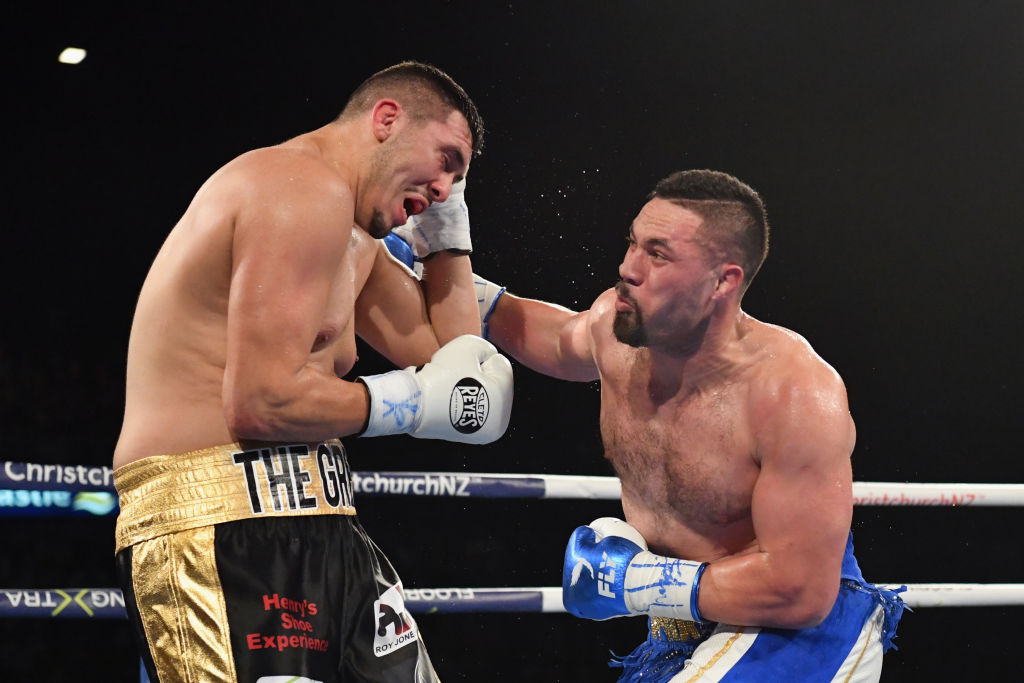 Joseph Parker (R) lands a punch on Alexander Flores. Photo: Getty