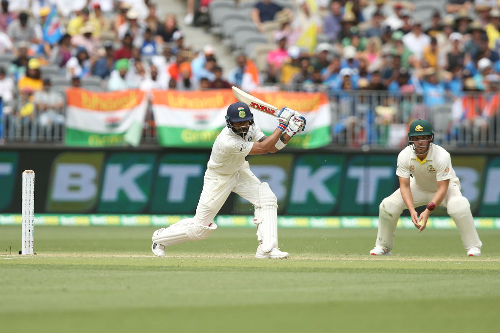 India's Virat Kohli on the drive against Australia on day two of the second test. Photo: Getty