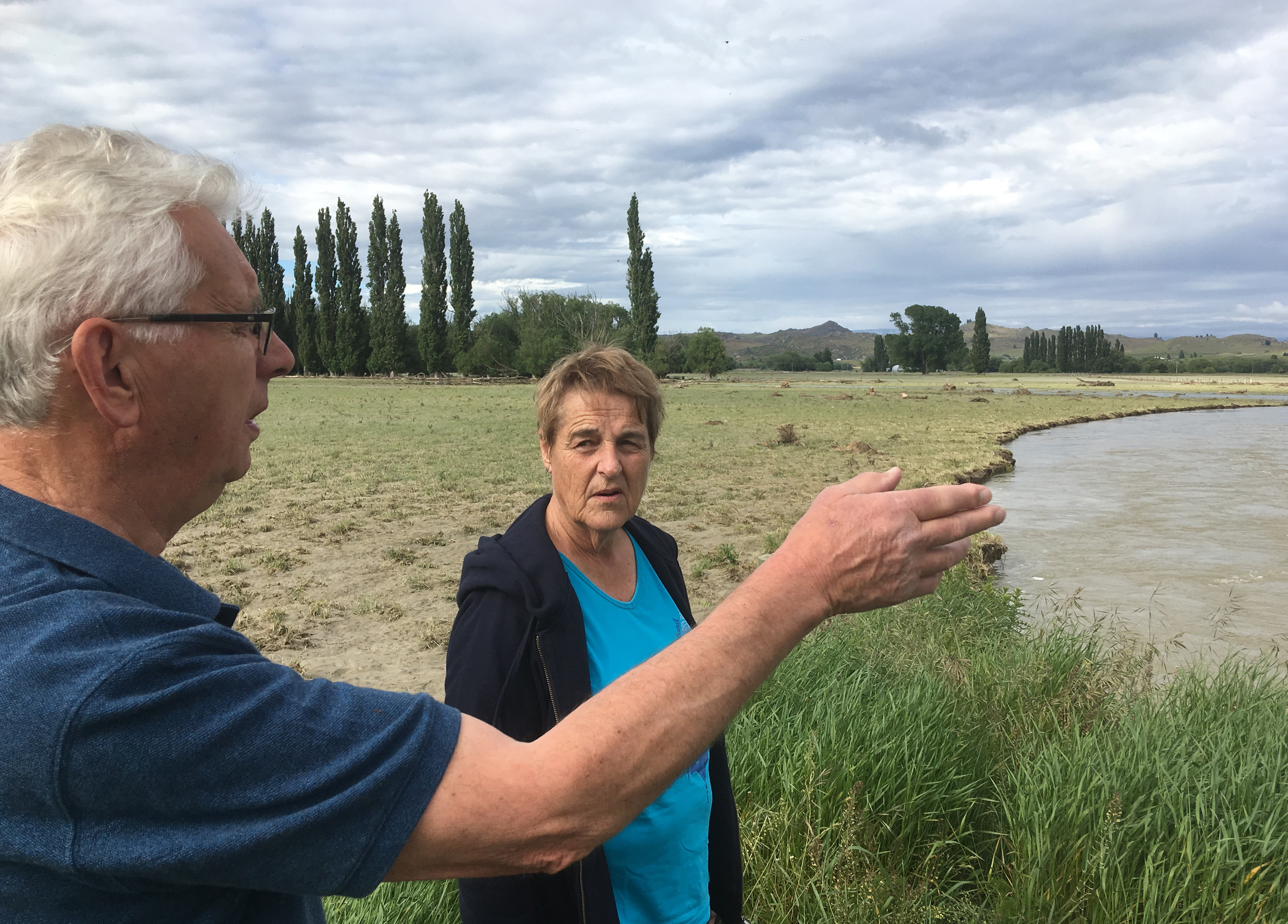 Ophir residents Malcolm Topliss and Irene Leask investigate the damage caused to local farmland...