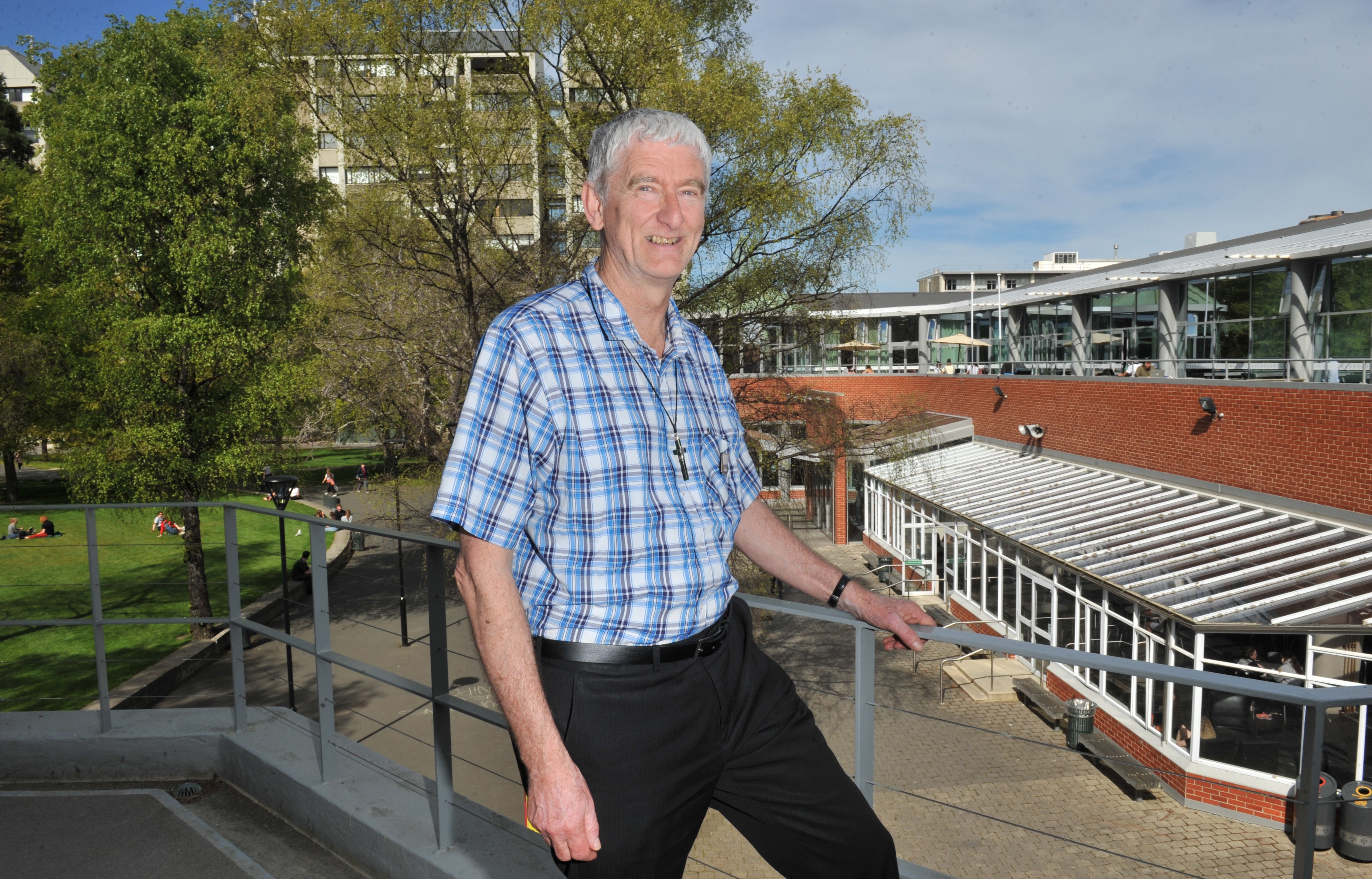 University of Otago chaplain the Rev Greg Hughson looks out over the campus. Photo: ODT