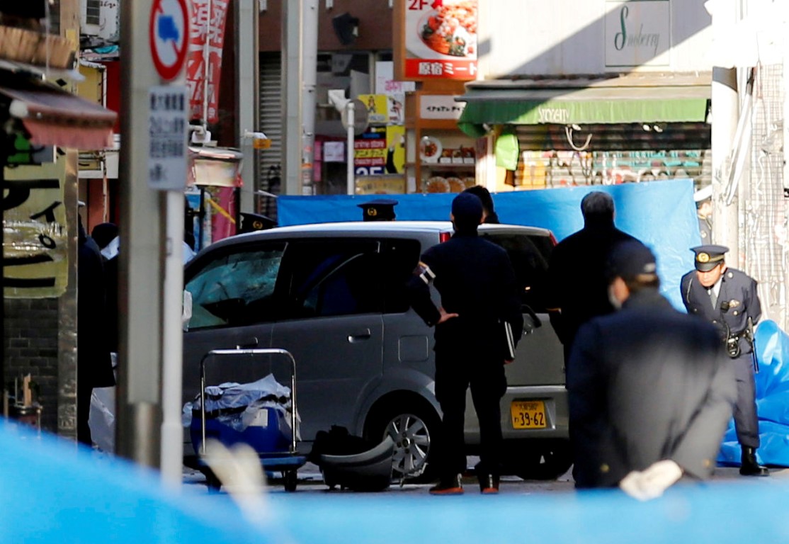 Police at the scene in Tokyo on Tuesday morning. Photo: Reuters