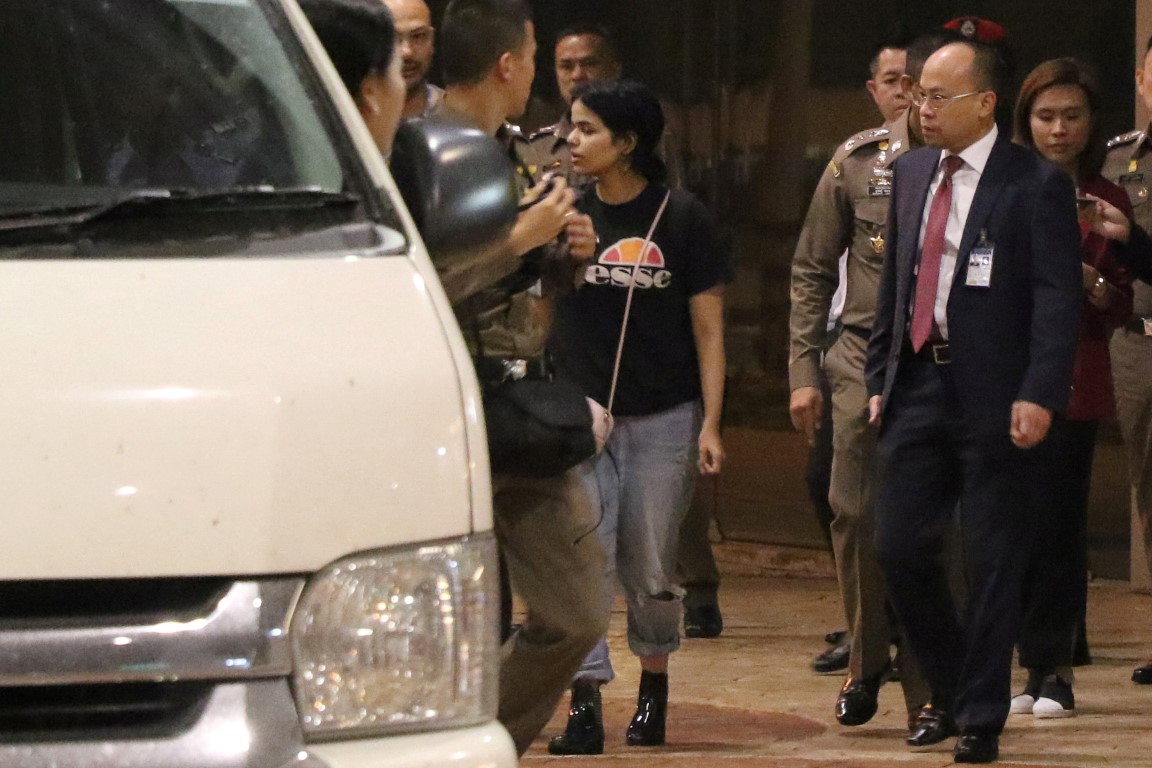 Accompanied by UNHCR members and Thai immigration authorities, Rahaf Mohammed al-Qunun leaves...