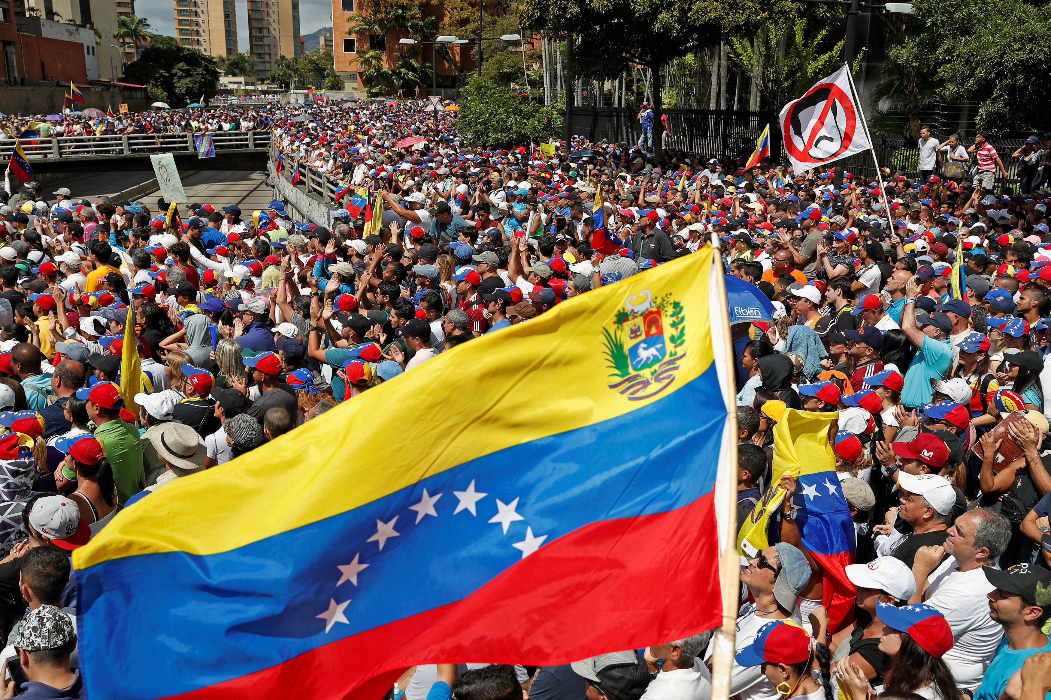 Opposition supporters hold rallies against Venezuelan President Nicolas Maduro's government....