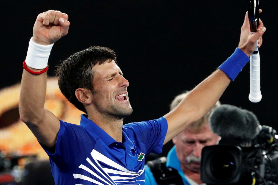 Novak Djokovic celebrates his victory over Lucas Pouille. Photo: Reuters