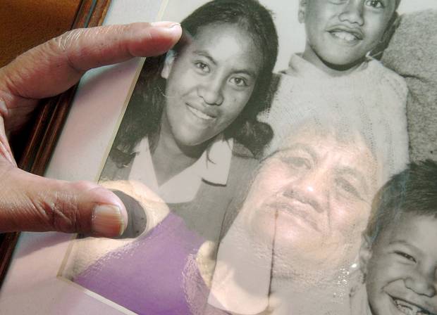 Mary Dillon stares at a picture of her sister Olive Walker who was murdered. Rotorua Daily Post...