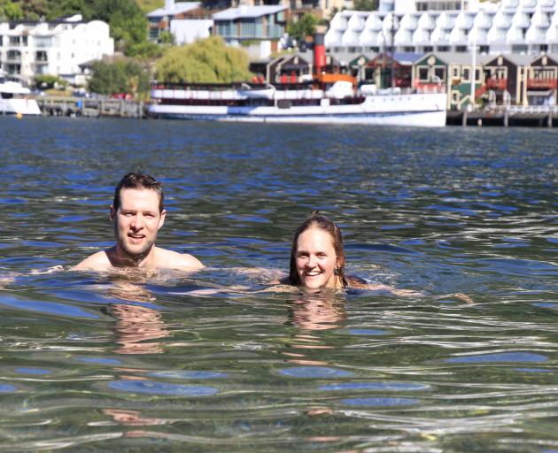 Swimmers in Queenstown Bay on Christmas Day last year. 