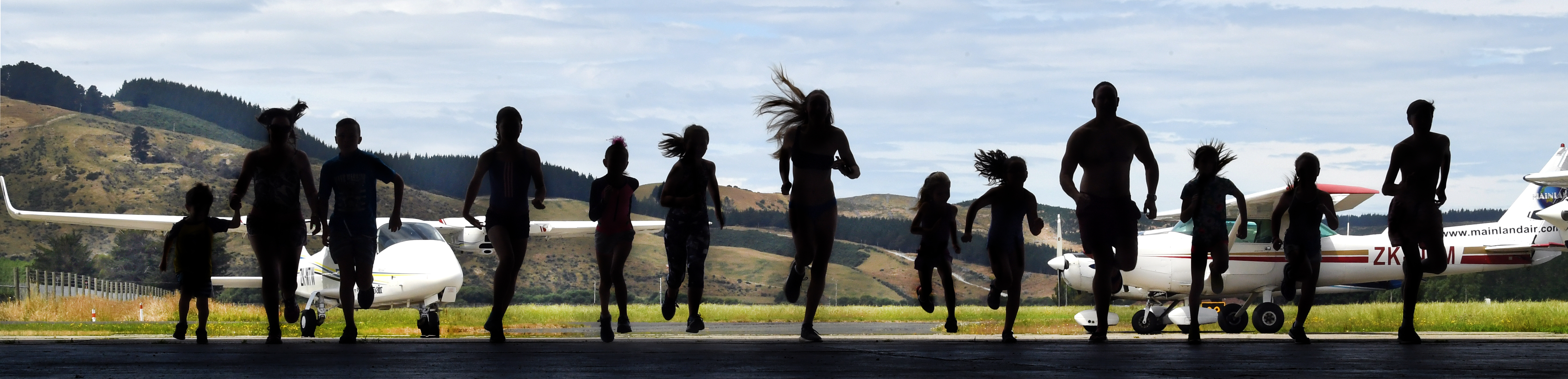 A group of keen swimmers were out practising at the airport yesterday for the Run the Runway...