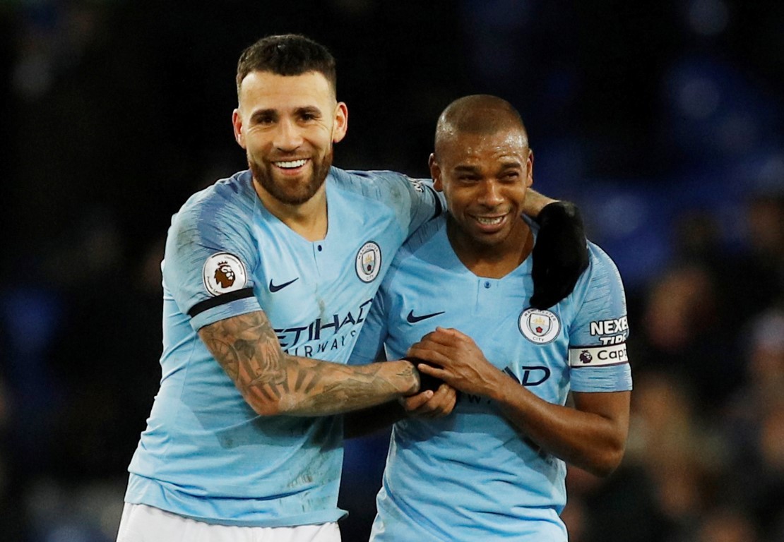 Manchester City's Nicolas Otamendi and Fernandinho celebrate their victory. Photo: Reuters