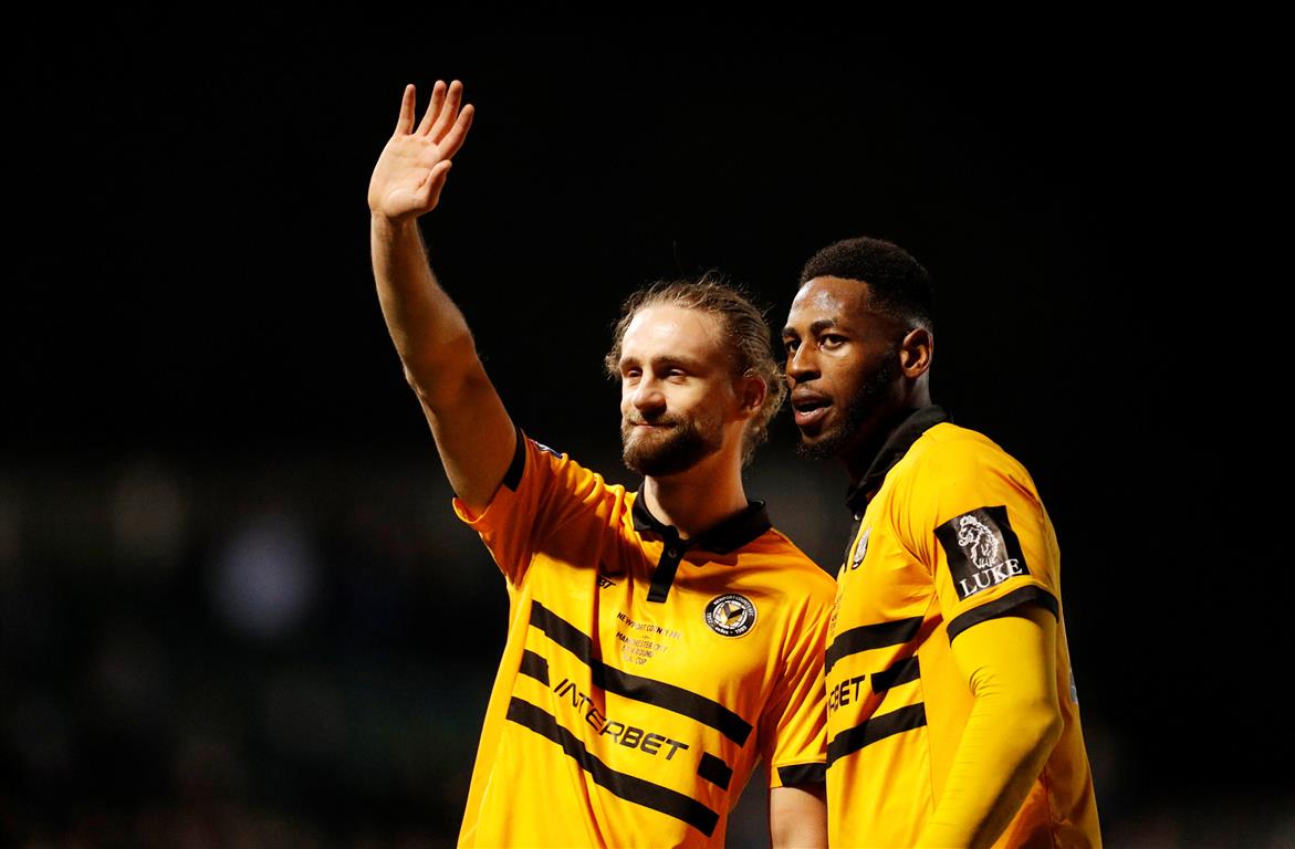 Newport's Fraser Franks and Jamille Matt salute their fans after the match Photo: Reuters