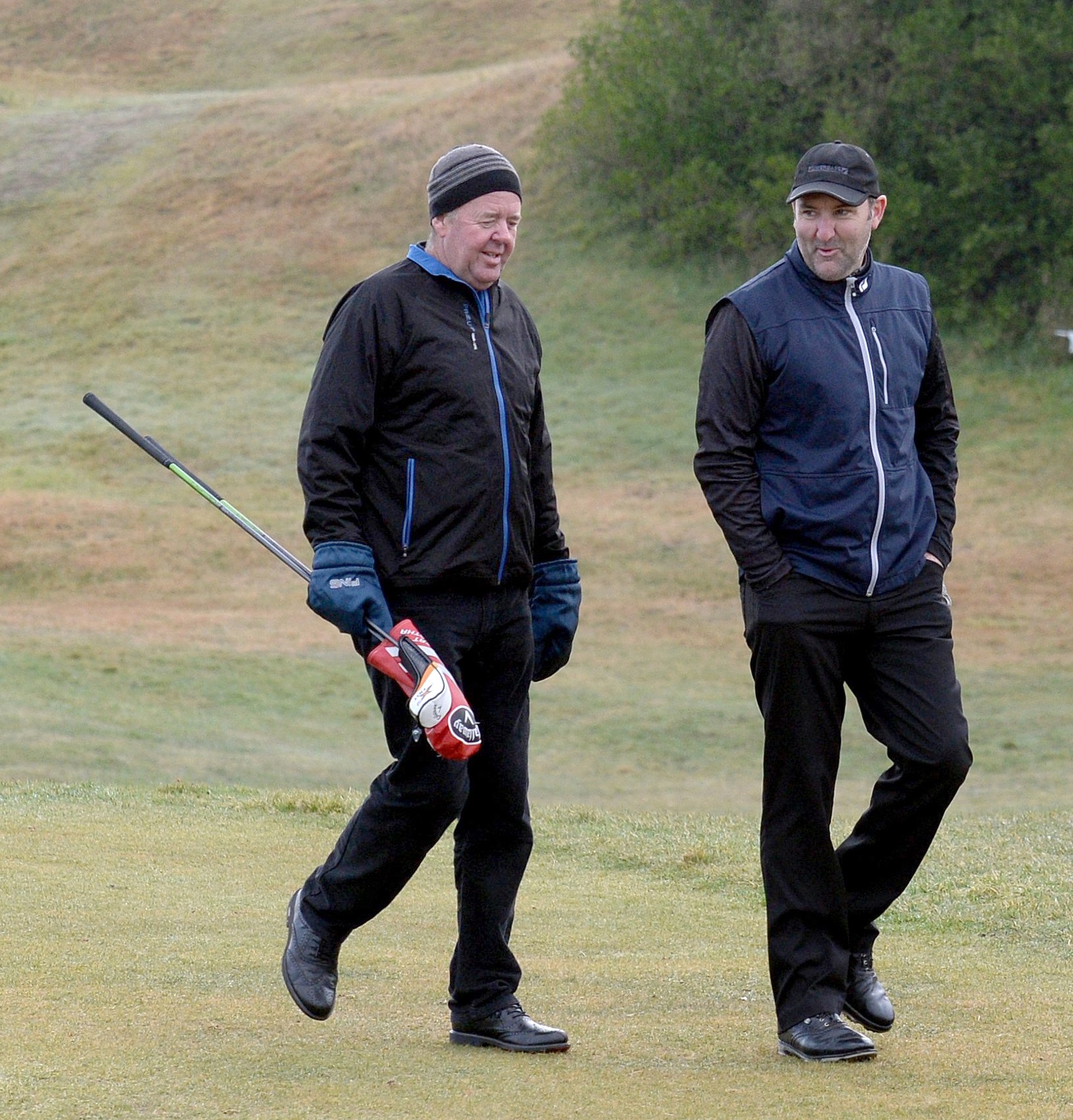 Greg Turner (left) and Mahal Pearce at a golf event at Chisholm Park links in 2016.PHOTO: LINDA...