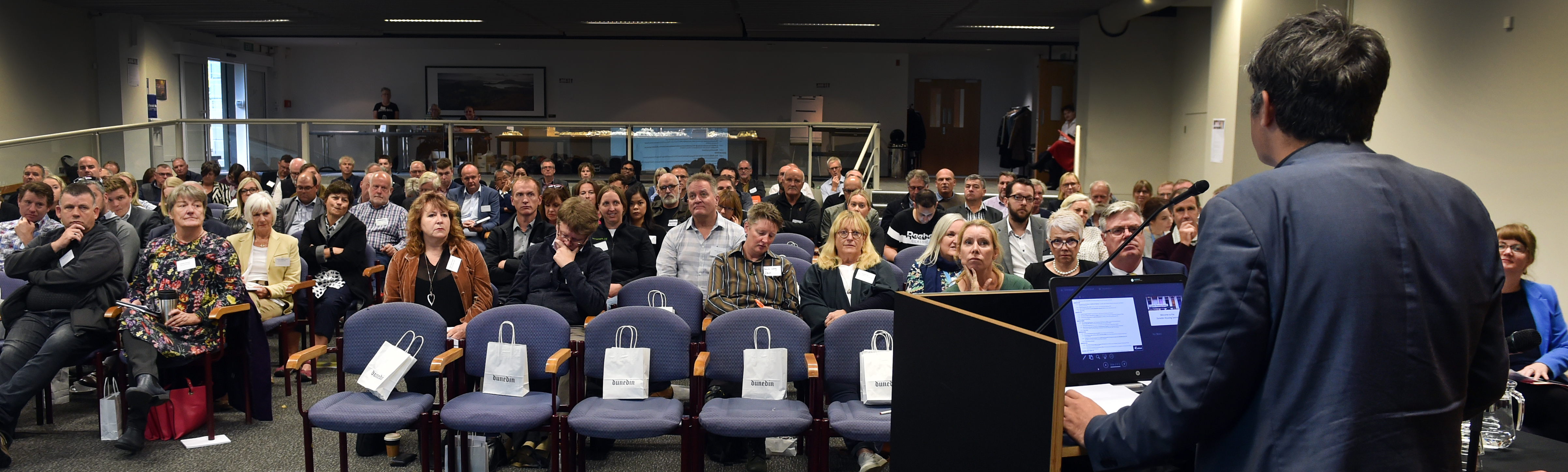 Dunedin city councillor Aaron Hawkins welcomes attendees to the Mayor's Taskforce on Housing...