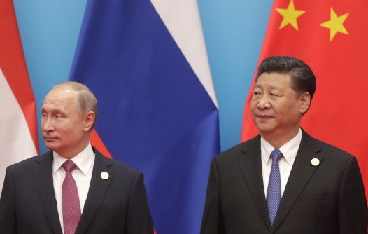 Russia's President Vladimir Putin and the President of the People's Republic of China, Xi Jinping...