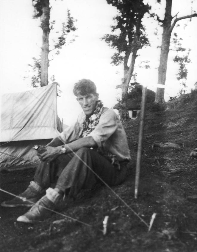 Sir Edmund Hillary sits at base camp, preparing for his successful attempt to be the first to...