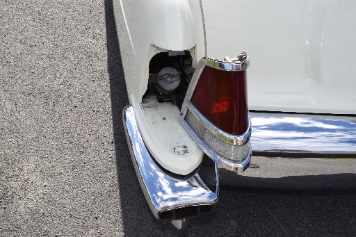 Quirky feature ... The fuel cap behind a swing-away tail light.