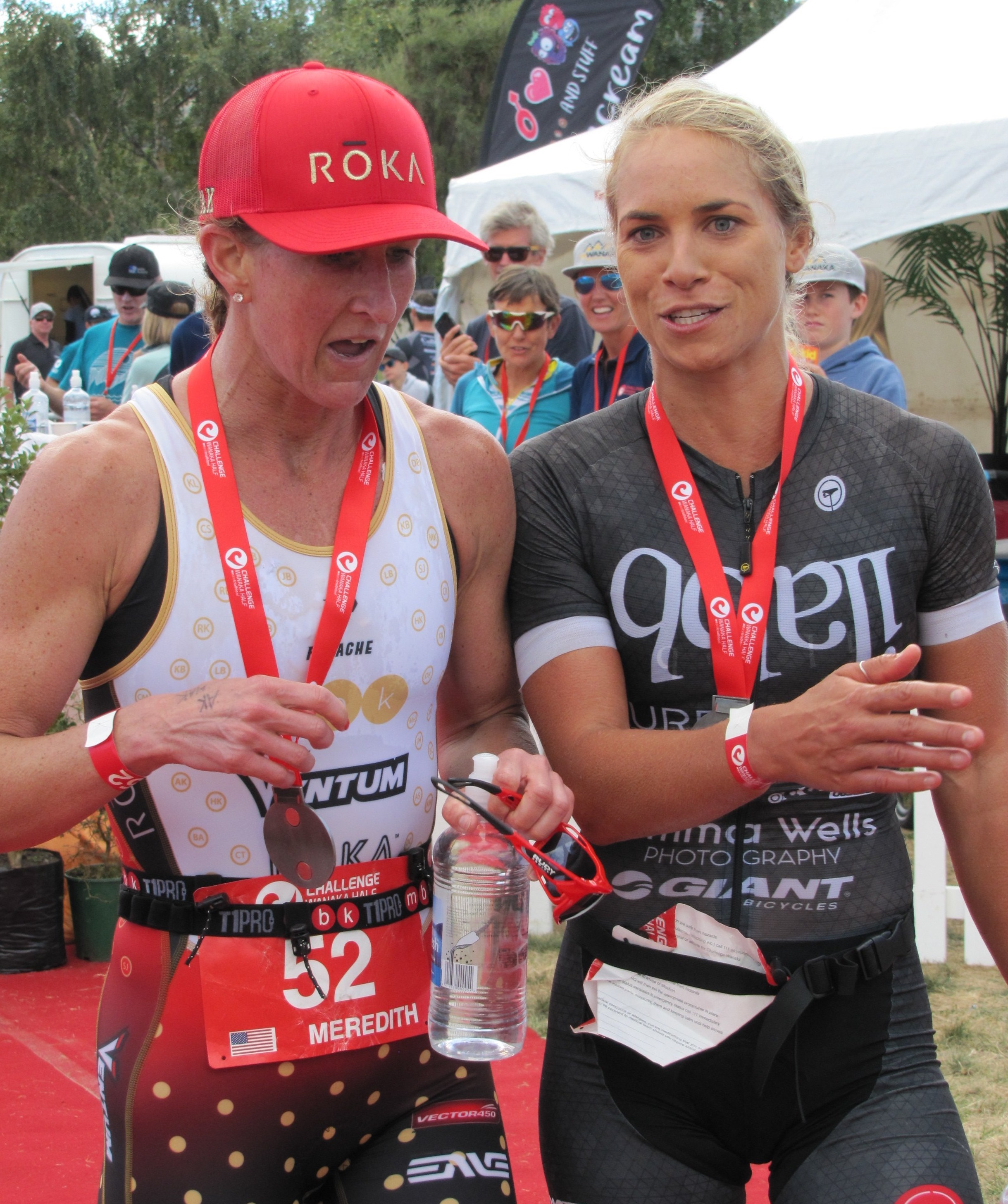 First woman home, Hannah Wells (right), of Tauranga, compares notes with second-placed American...
