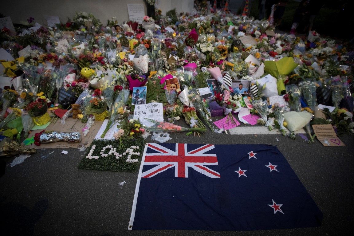 Flowers placed in tribute to the victims on a wall outside the Al Noor mosque in Christchurch....