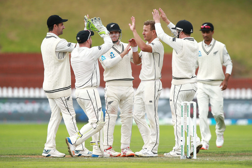 Neil Wagner celebrates with teammates after taking the wicket of Bangladesh's Taijul Islam. Photo...