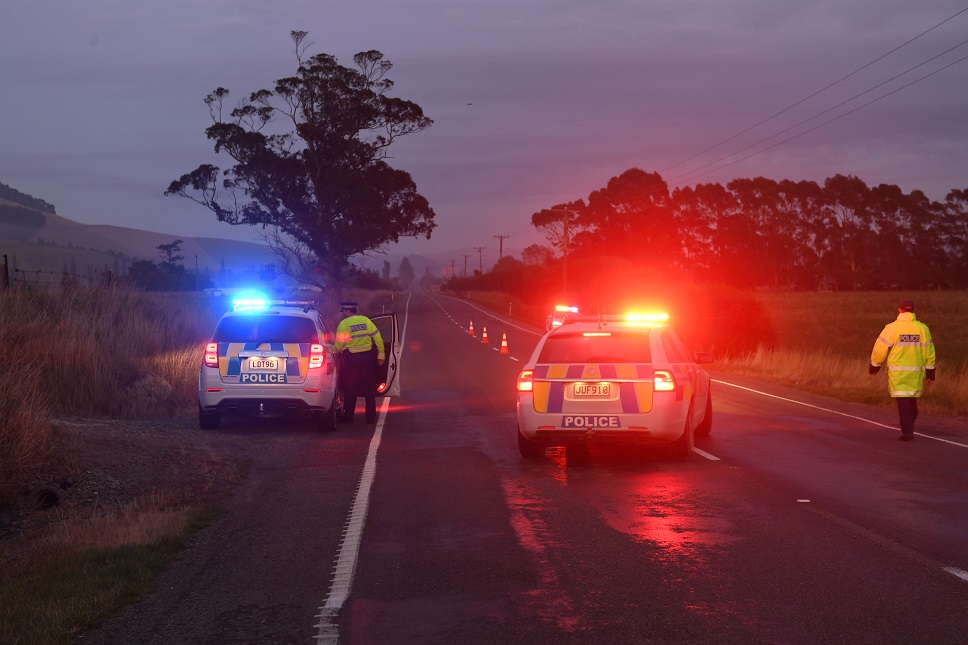 Police near the scene of the crash this morning. Photo: Stephen Jaquiery