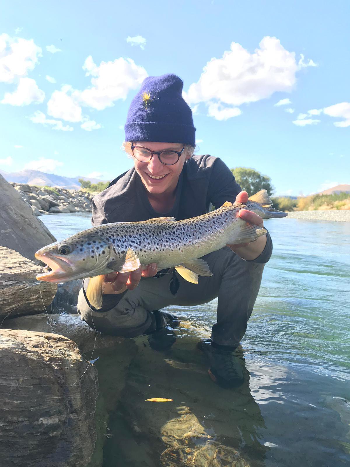 Karim Hadaya and a fish caught in the Mataura River. PHOTO: SUPPLIED