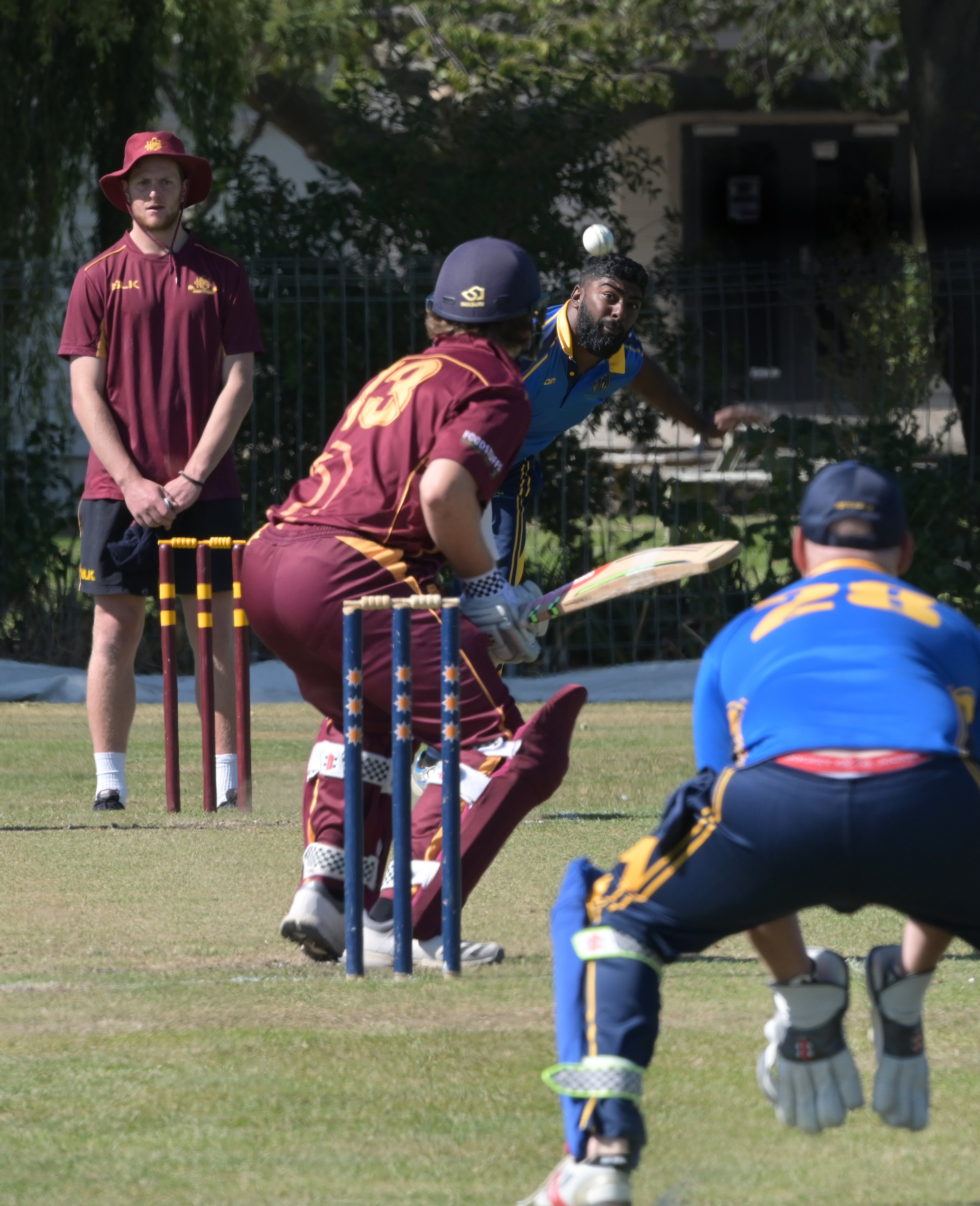 North East Valley batsman Llew Johnson prepares to play a delivery from University-Grange bowler...