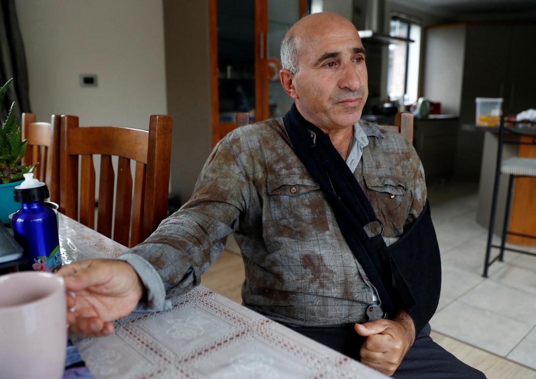 Hazem Mohammed speaks about experiences during the attacks, at his home in Christchurch late last...