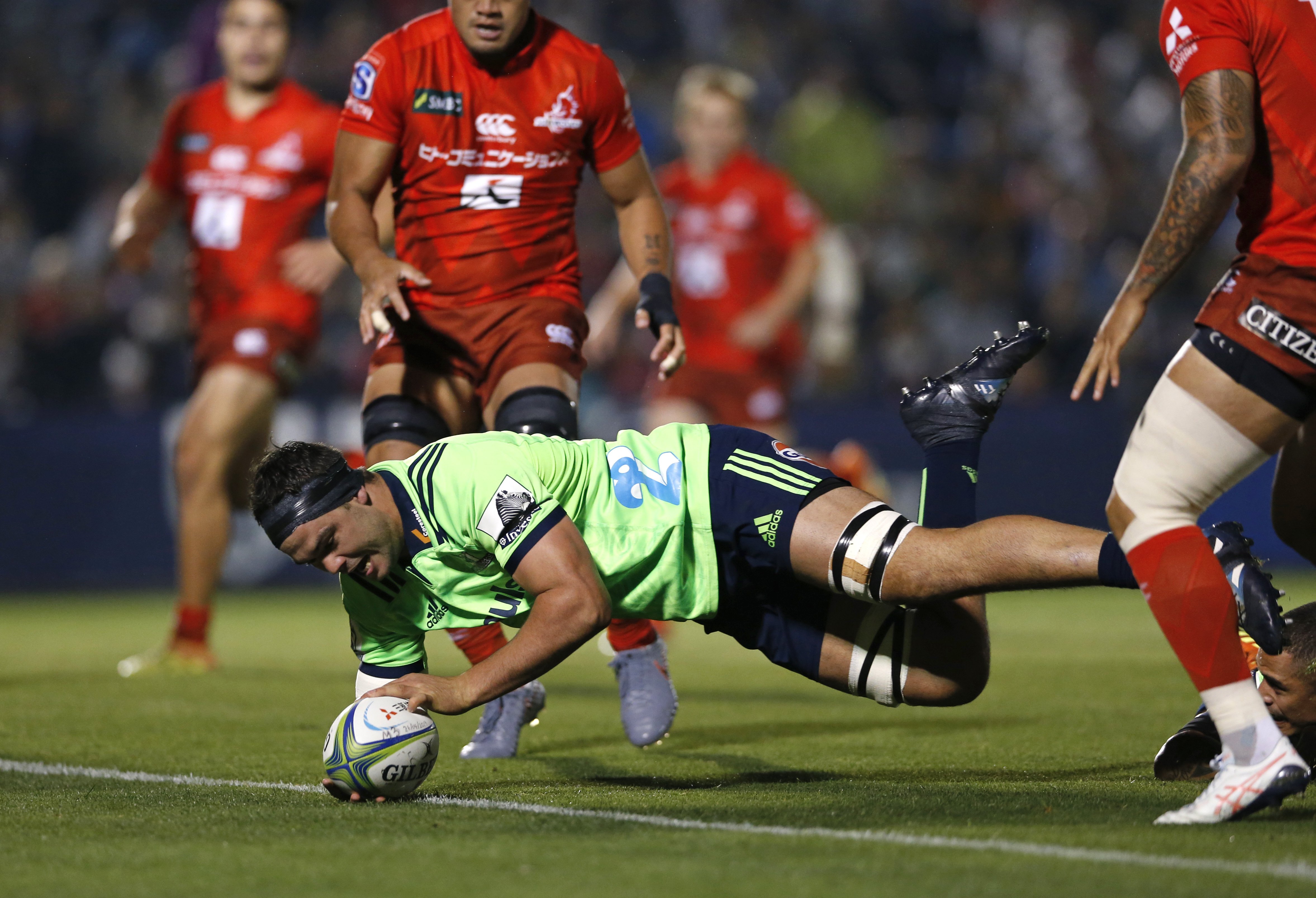 Highlanders Lock Tom Franklin scores a try early in the first half in their game against the...