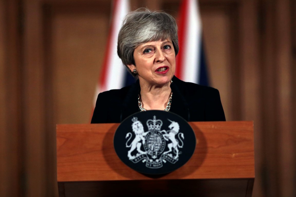 British Prime Minister Theresa May says she will seek to further delay Britain's exit from the...