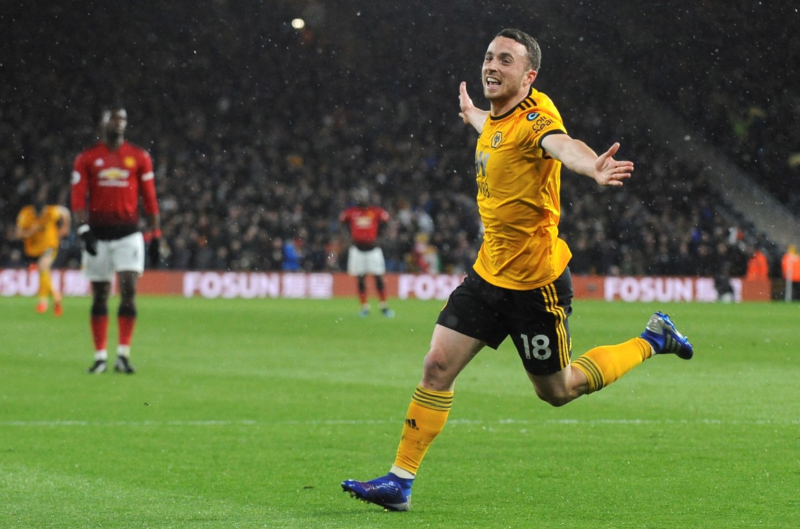Wolverhampton's Diogo Jota celebrates after scoring his side's first goal against Manchester...