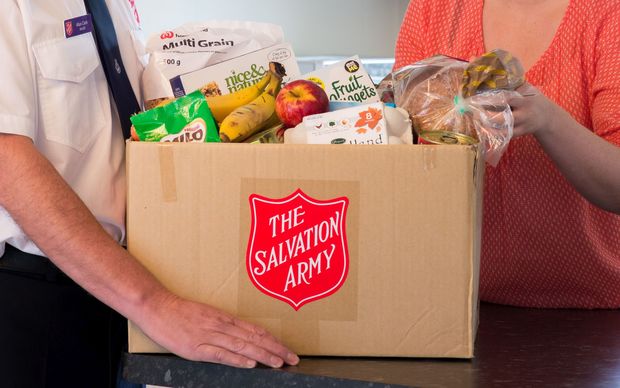 Volunteers and staff throughout New Zealand spent the festive season packing and handing out 14,394 food parcels. Photo: Supplied via RNZ