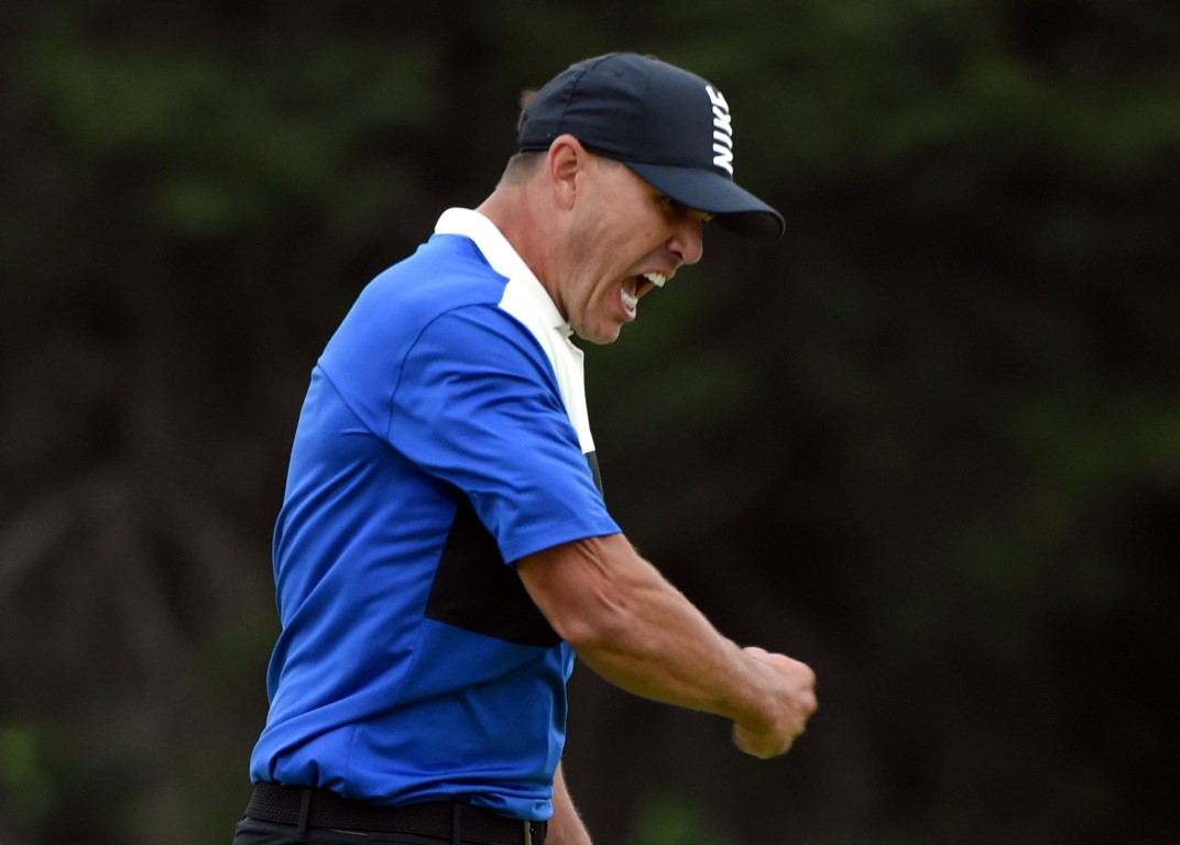 Brooks Koepka celebrates his victory in the PGA Championship golf tournament at Bethpage State...
