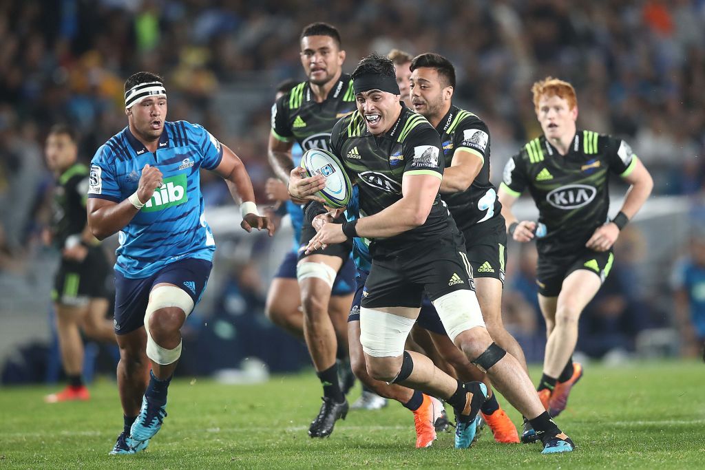 The Hurricanes' Kane Le'aupepe makes a break against the Blues. Photo: Getty